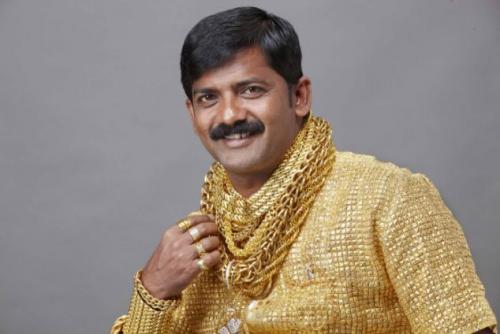 Indian man full of gold
